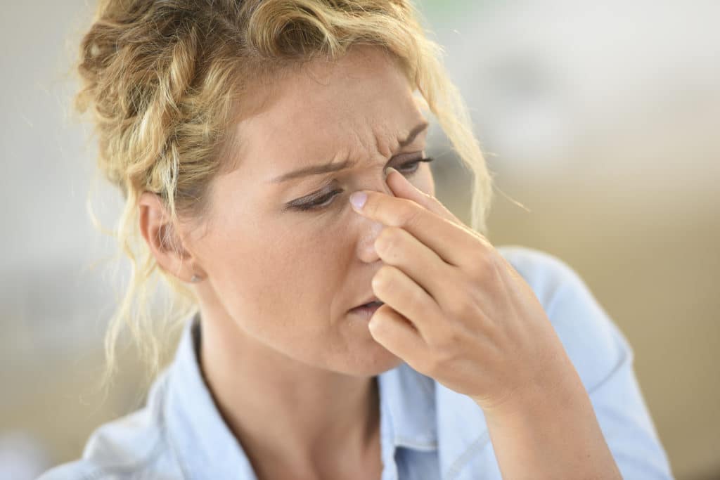 Woman suffering sinusitis